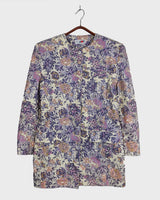 This floral lightweight cotton blazer screams vintage 80s vibes with its long silhouette and shoulder pads!