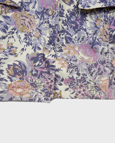 This floral lightweight cotton blazer screams vintage 80s vibes with its long silhouette and shoulder pads!