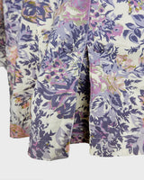 This floral lightweight cotton blazer screams vintage 80s vibes with its long silhouette and shoulder pads!
