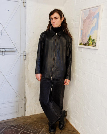 Grab this premium vintage 80s black nappa leather jacket for a timeless and minimalism look! The lightweight fabric makes it an ideal choice for warmer weather such as spring or summer. This leather jacket is designed to last!