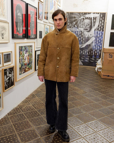 This jacket is an absolute classic! Stay warm in this vintage 80s brown and beige leather winter jacket. Perfect for any size between M - small L, you'll surely slay the day!