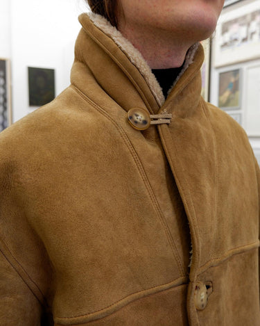 This jacket is an absolute classic! Stay warm in this vintage 80s brown and beige leather winter jacket. Perfect for any size between M - small L, you'll surely slay the day! 