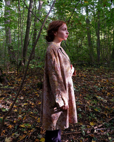 Embrace the vibe of this vintage 80s lightweight coat! Featuring a colorful floral pattern, this XL coat adds a pop of personality to any outfit.