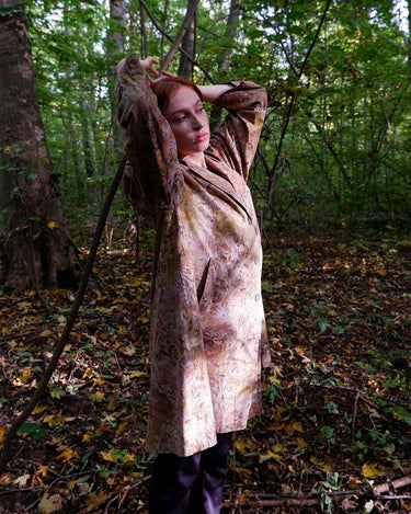 Embrace the vibe of this vintage 80s lightweight coat! Featuring a colorful floral pattern, this XL coat adds a pop of personality to any outfit.