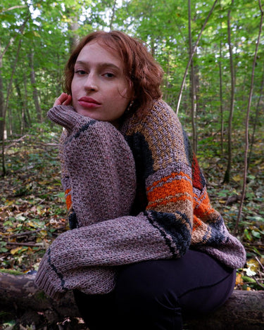 Enhance your wardrobe with a touch of color through this vintage 80's pink sweater. Its XL size and vibrant stripes make for a playful addition to any outfit.