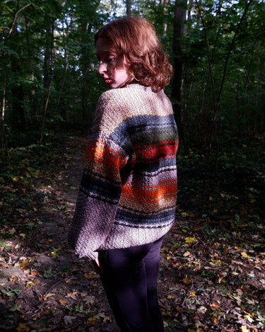 Enhance your wardrobe with a touch of color through this vintage 80's pink sweater. Its XL size and vibrant stripes make for a playful addition to any outfit.