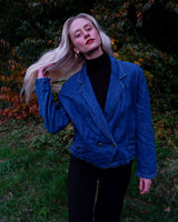 Indulge in your love for denim with this vintage 80s two rows blazer in classic blue. A must-have for any denim enthusiast, this jacket is a timeless addition to your wardrobe.