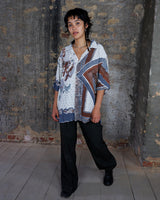 Vintage 90s brown and white patterned shirt in L-XL, designed for anyone who’s all about that authentic vintage vibe. Lightweight and relaxed, it brings easygoing style to your daily look without breaking a sweat. Perfect for those who want to keep it cool and casual every day.