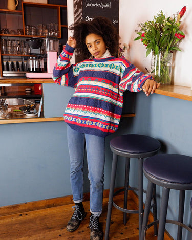 Stay warm and rainbow-bright with this eye-catching United Colors of Benetton shetland wool sweater! Featuring a vibrant array of colors, this classic piece will be sure to up your style game! It's perfect for any season!