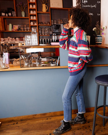 Stay warm and rainbow-bright with this eye-catching United Colors of Benetton shetland wool sweater! Featuring a vibrant array of colors, this classic piece will be sure to up your style game! It's perfect for any season!