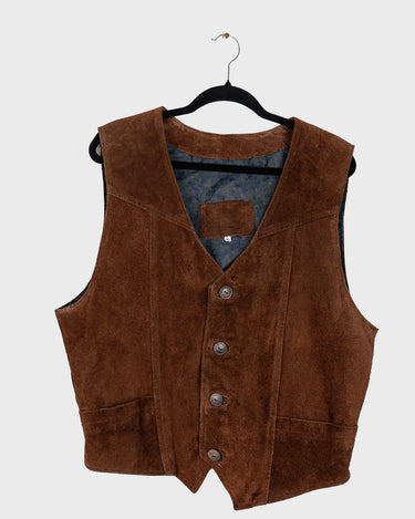 Looking for that perfect 90s vibe? This vintage brown suede vest nails it. Soft suede, relaxed cut – fits M to L. Easy to style, whether layered or worn solo. A classic piece with laid-back attitude.