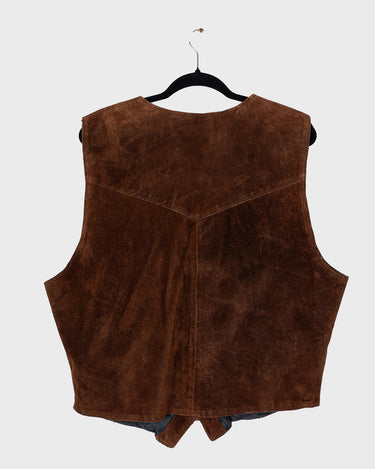 Looking for that perfect 90s vibe? This vintage brown suede vest nails it. Soft suede, relaxed cut – fits M to L. Easy to style, whether layered or worn solo. A classic piece with laid-back attitude.