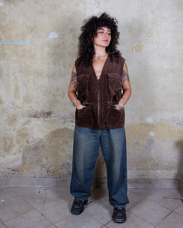 Looking for a vintage piece that's both classic and cool? Check out this 90s brown cotton vest from Marlboro! Ready to embrace the laid-back vibe