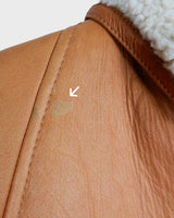 Leave the cold winter days behind and upgrade your wardrobe with this vintage 80s brown shearling coat! Luxuriously soft and cozy, it has a casual fit that makes it perfect for everyday wear. So why not give yourself a timrless 80s-inspired look? It'll definitely keep you!