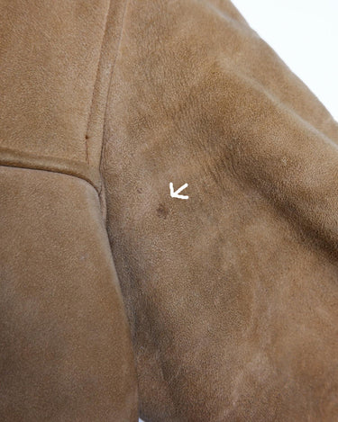 This jacket is an absolute classic! Stay warm in this vintage 80s brown and beige leather winter jacket. Perfect for any size between M - small L, you'll surely slay the day! 