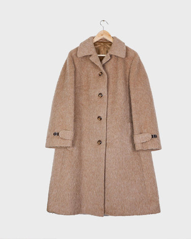 This Premium Vintage 80s llama coat is a real keeper! It's fluffy and cuddly in a beige brown A-form, perfect for sprinkling some furry fun into your style.