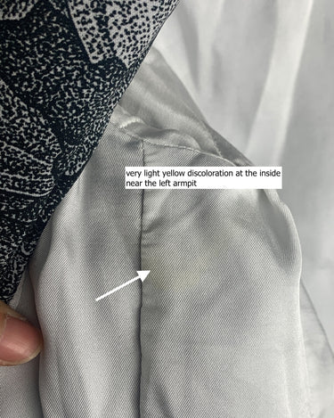 Make a statement with this vintage Escada blazer—bold, tailored, and anything but ordinary. Its detailed monochrome botanical print and iconic Escada cut turn timeless elegance into something effortlessly cool. A rare secondhand gem for lovers of slow fashion and sharp silhouettes, this piece brings instant edge to any outfit. Vintage luxury, with attitude.