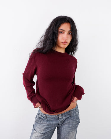 A women wears a Preloved burgundy silk and cashmer mix sweater | S-M from the online shop Vinti Vintage