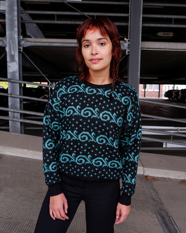 Vintage 80s ARIETE black lana wool mix sweater with shimmer details and turquoise swirl pattern | S–M.