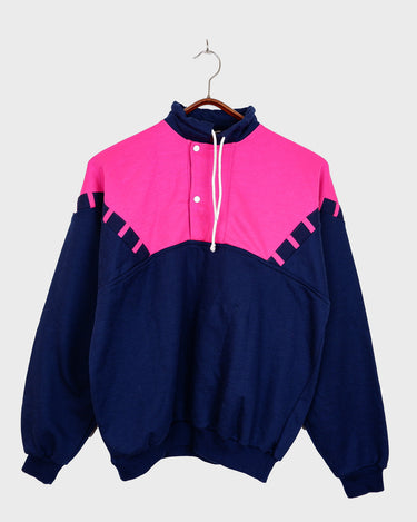 Get cozy in this vintage 80s sporty sweater, lined for warmth and featuring bold navy blue and pink hues. Designed to fit L-XL, it’s perfect for chilly days. Embrace the fun side of vintage!