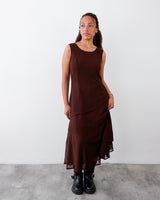 a woman is wearing a Vintage 90s maxi dress with asymmetric ruffle hem, grunge fairycore style | S-M by vinti vintage