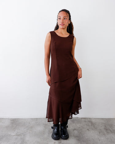 a woman is wearing a Vintage 90s maxi dress with asymmetric ruffle hem, grunge fairycore style | S-M by vinti vintage
