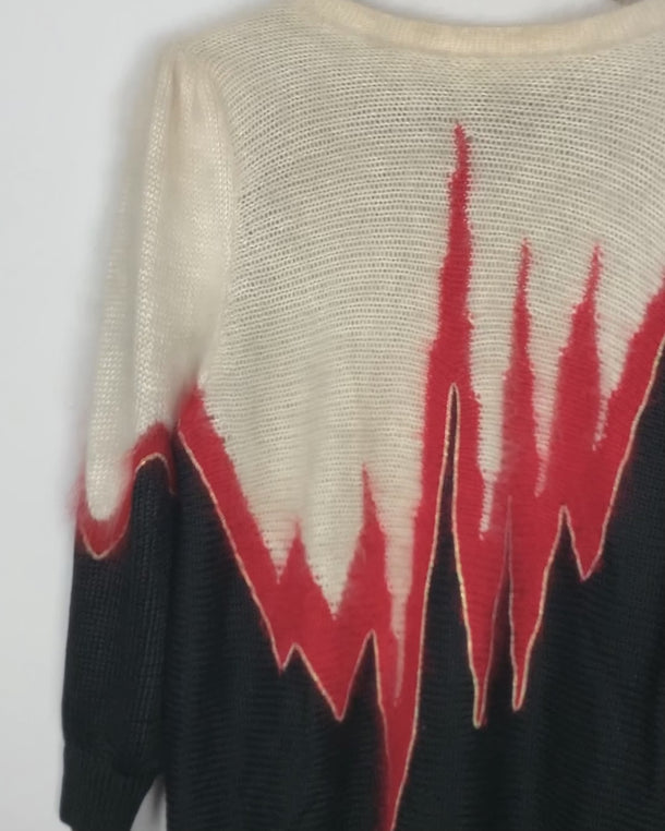 Embrace the heat with this fiery vintage 80s 90s flame sweater. Perfect for those who love to make a statement!