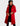 a woman is wearing a 90s vintage red coat.